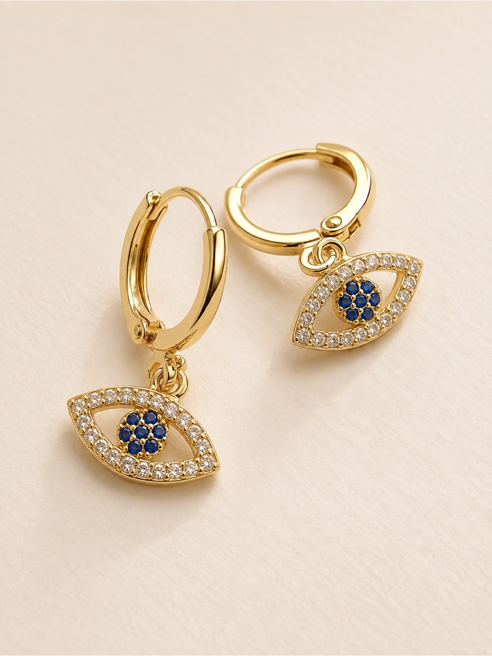 Gold Plated Evil Eye Huggie Hoop Earrings with Blue Crystal Center